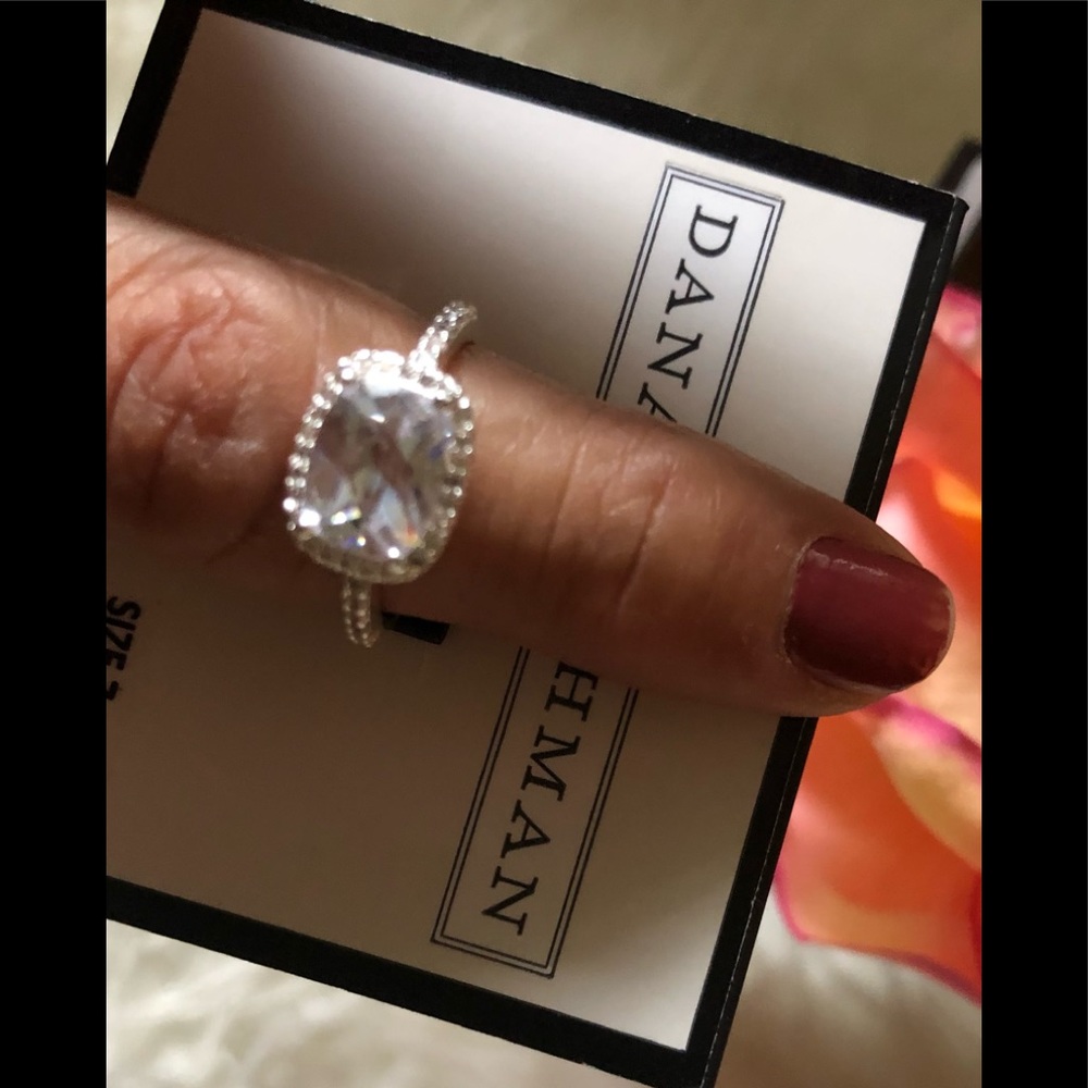 Dana Buchman/ Sterling Silver lab created spinal and cubic zirconia halo ring.